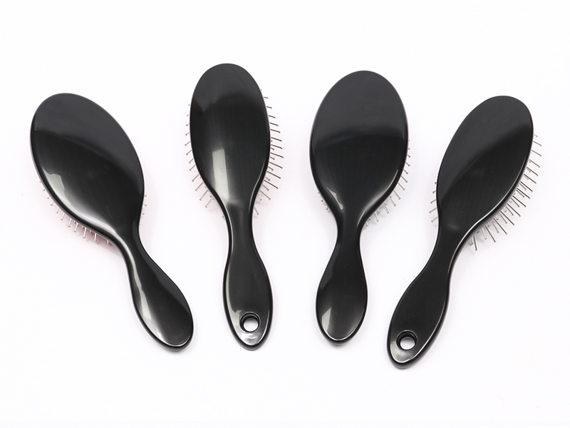 Plastic haarborstel voor massage met peddelkop