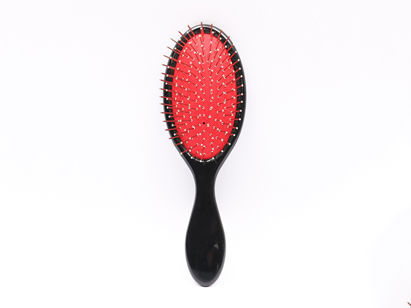 Plastic haarborstel voor massage met peddelkop