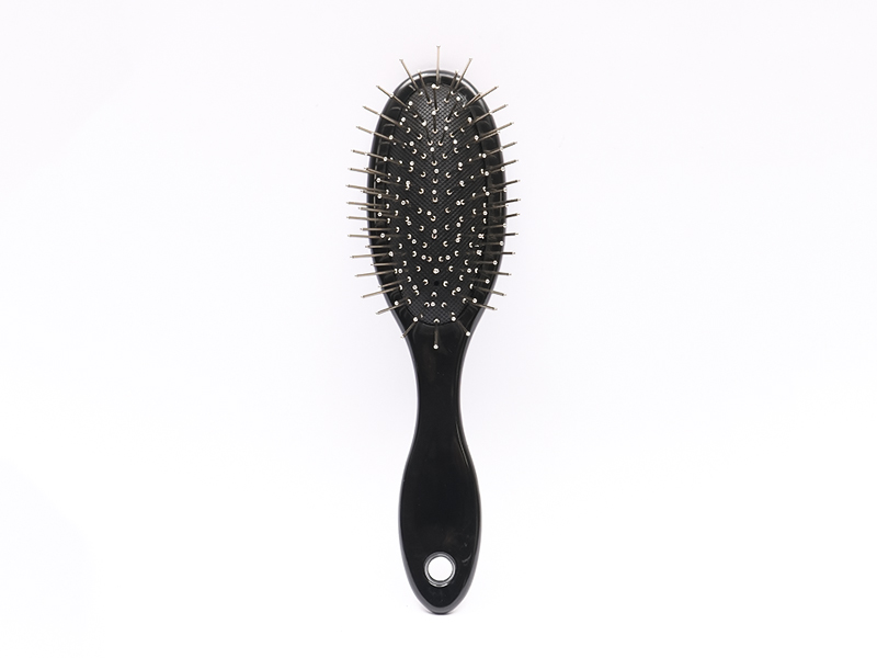 Plastic haarborstel voor massage met peddelkop