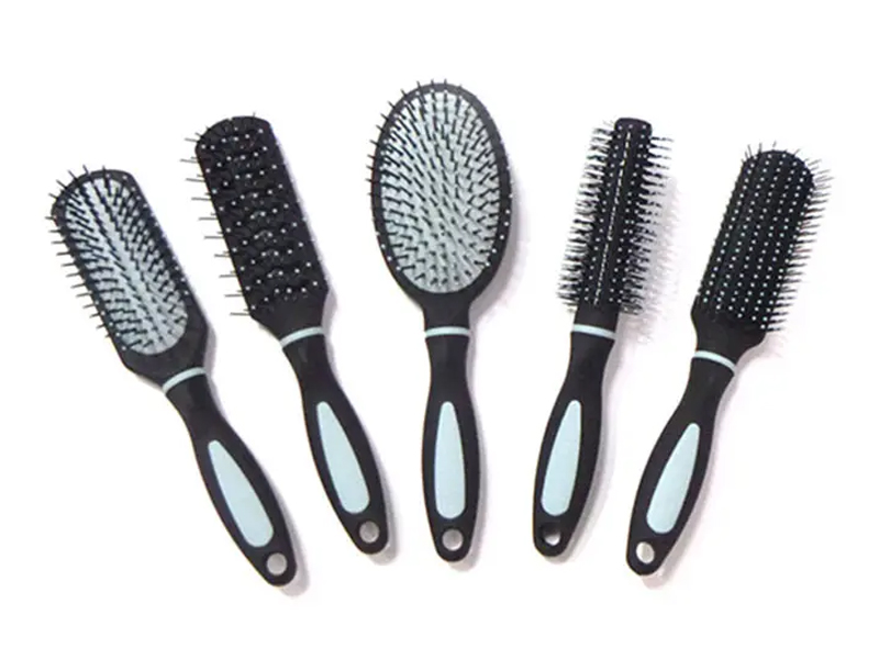 Plastic handvat ontwarren hoofdhuidmassagekamset met harde haren