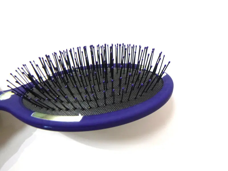 Plastic ontwarrende haarextensiesborstel