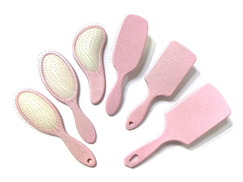 Roze plastic fancy paddle-haarborstel