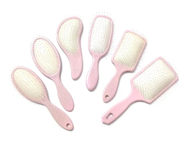 Roze plastic fancy paddle-haarborstel