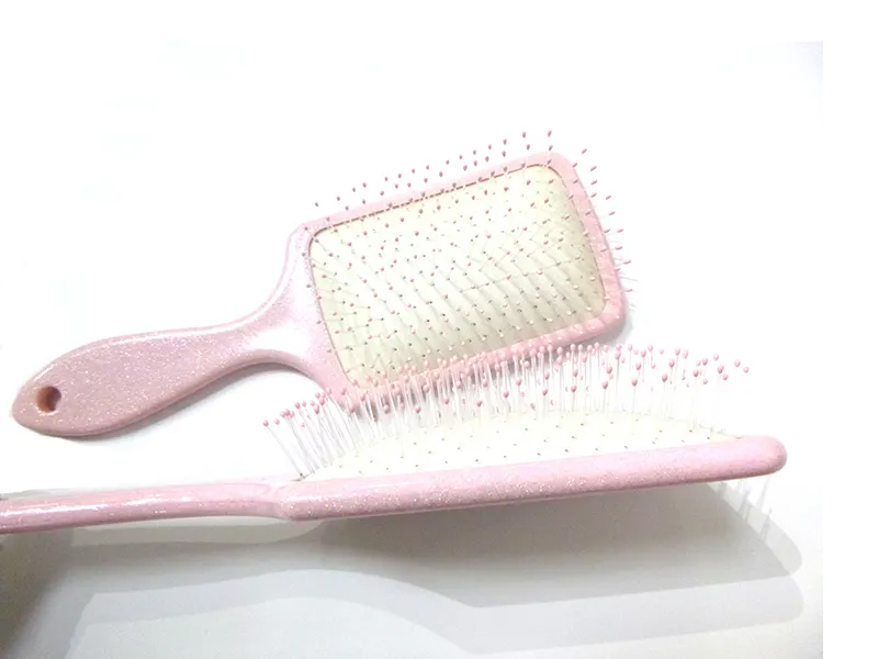 Roze plastic fancy paddle-haarborstel