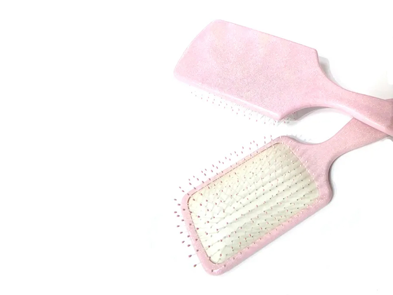 Roze plastic fancy paddle-haarborstel