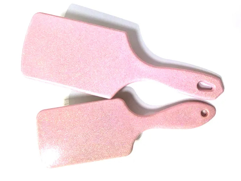Roze plastic fancy paddle-haarborstel