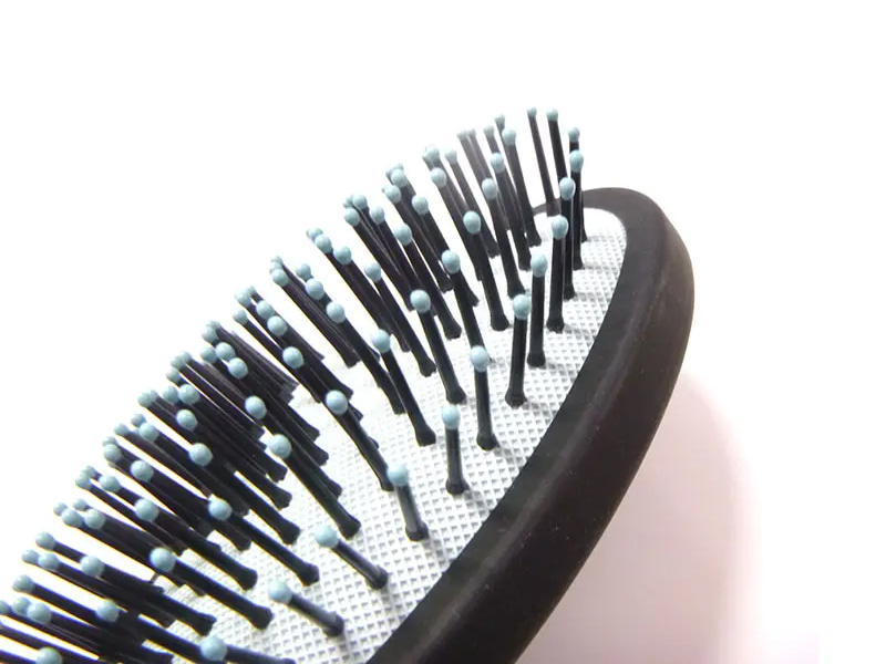 Plastic handvat ontwarren hoofdhuidmassagekamset met harde haren