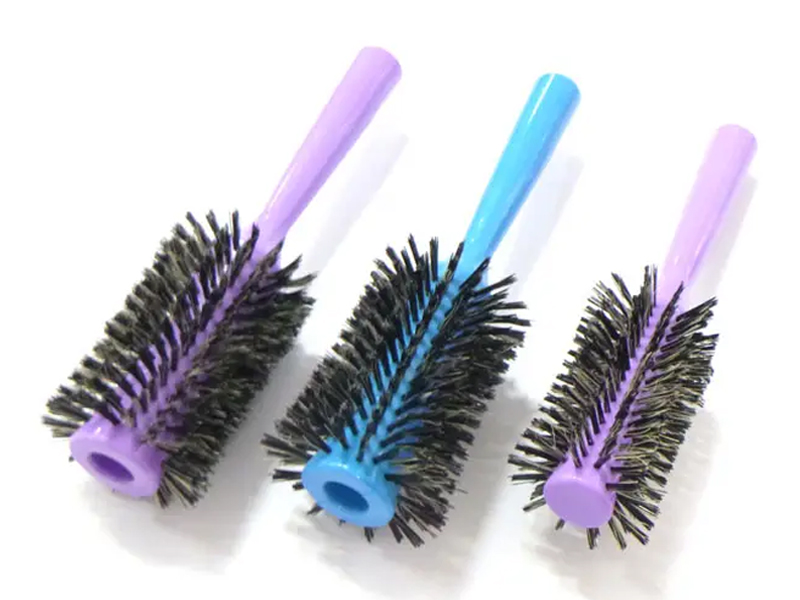 Ronde kleurrijke nylon en varkenshaar haarstyling haarborstel
