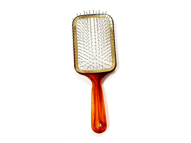 Amberkleurige paddle-haarborstel met metalen pinnen