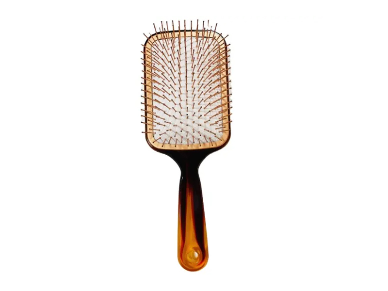 Amberkleurige paddle-haarborstel met metalen pinnen