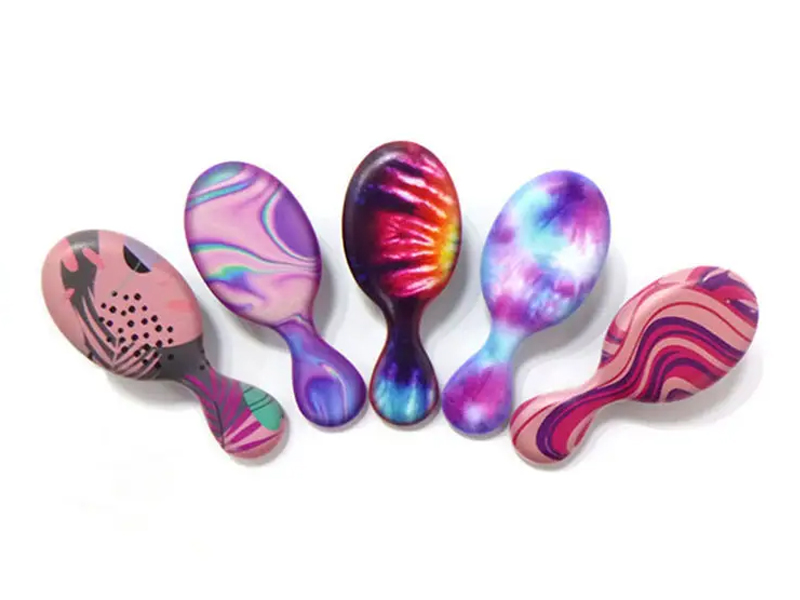 Baby ontwarrende peddelhaarmassager kleurkam